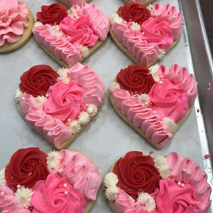 Delightful Heart-Shaped Cookies Decorated with Whimsical Icing for Celebrations.