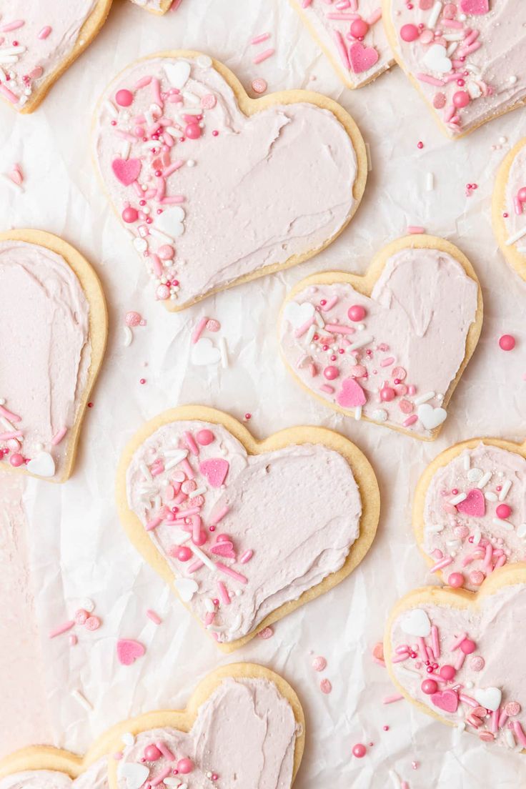 Delightful Heart-Shaped Cookies with Pastel Frosting and Whimsical Decorations for Festive Celebrations.