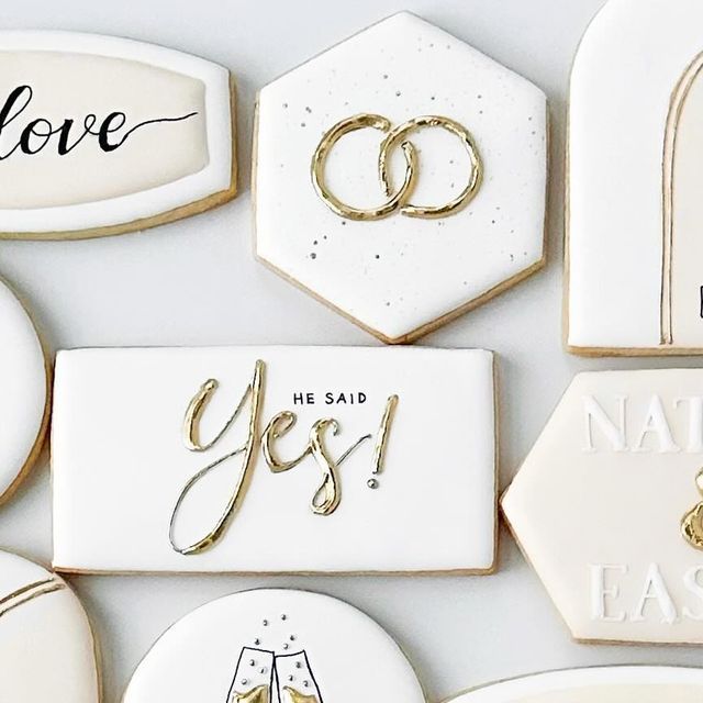 Luxurious Wedding-Themed Cookies with Intricate Designs and Playful Touches