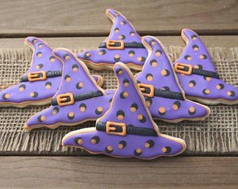 Whimsical Witch Hat Cookies with Purple Icing: Perfect Treats for Halloween Celebrations.