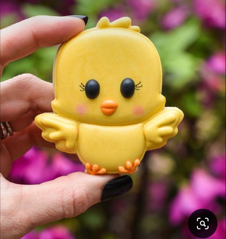 Charming Chick-Shaped Cookie Adorned with Vibrant Frosting and Springtime Accents.