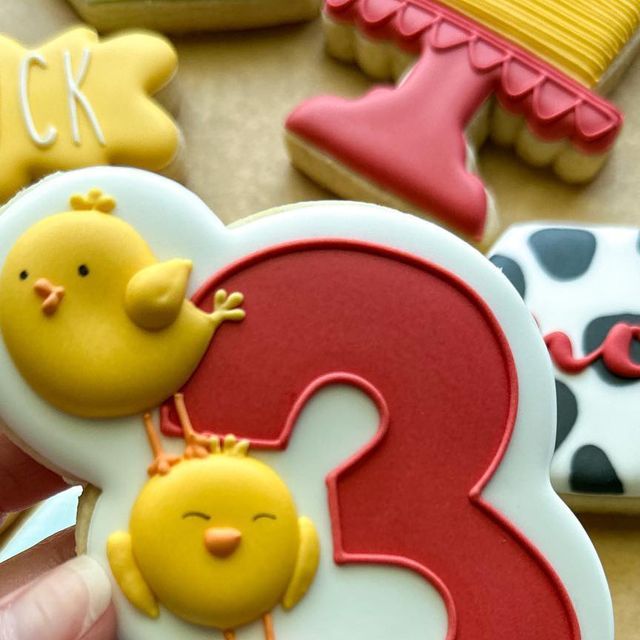 Cheerful Chick-Inspired Cookies with Bold Number Three: Perfect for Festive Celebrations.