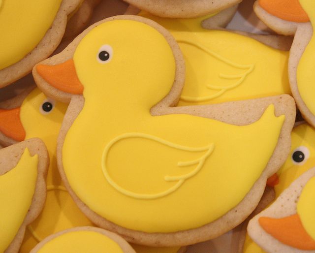 Cheerful Yellow Duck Cookies: Whimsical Treats for Vibrant Nail Design Inspiration.