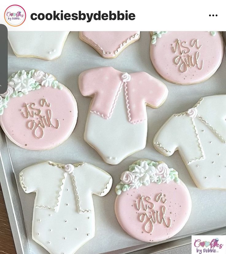 Delightful Baby Girl Cookies: Whimsical Onesies & Floral Designs in Pink and White.