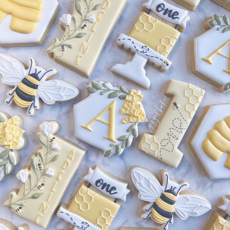 Whimsical Colorful Cookie Designs Featuring Bees, Honeycombs, and Floral Elements.