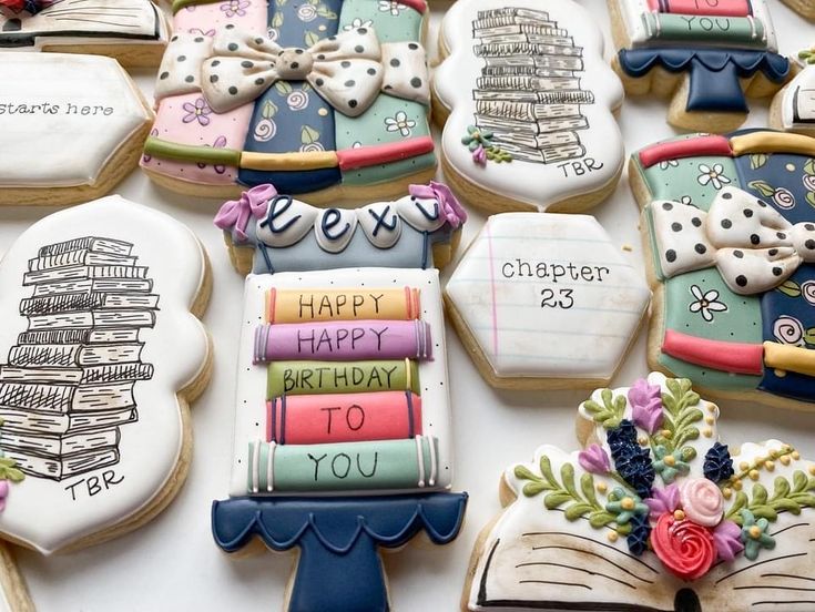 Whimsical Book-themed Cookies with Colorful Designs and Floral Accents.