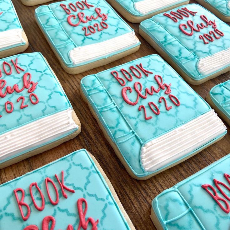 Book-Inspired Decorative Cookies with Vibrant Turquoise and Intricate Piping for Literary Events.