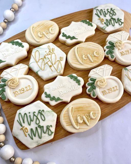 Charming Wedding-Themed Cookies with Intricate Designs for Bridal Celebrations