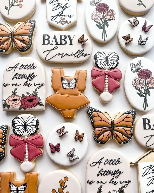 Whimsical Colorful Cookie Designs with Butterflies and Floral Motifs for Celebrations.