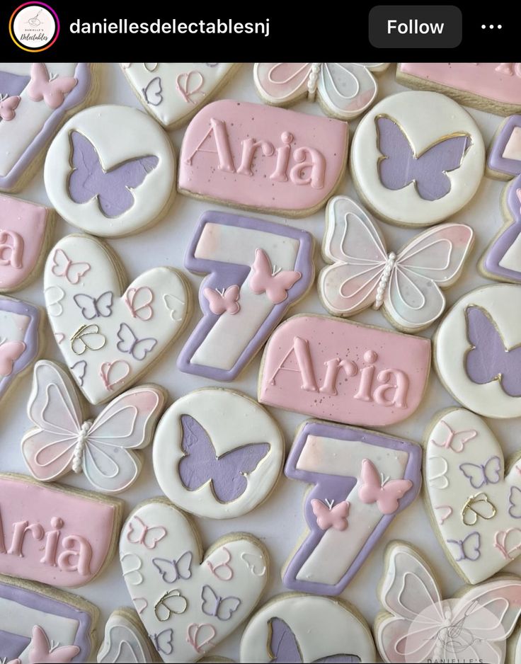 Pastel-Themed Cookie Arrangement Adorned with Whimsical Butterfly Designs.