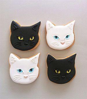 Charming Cat-Shaped Cookies with Playful Designs and Vibrant Details