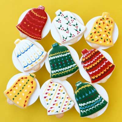 Festive Colorful Bell-Shaped Cookies: Intricate Designs & Vibrant Holiday Spirit