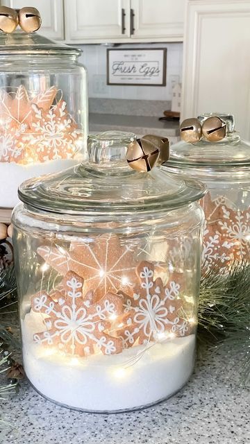 Festive Decorative Glass Jars with Snowflake Cookies Enhance Holiday Atmosphere.