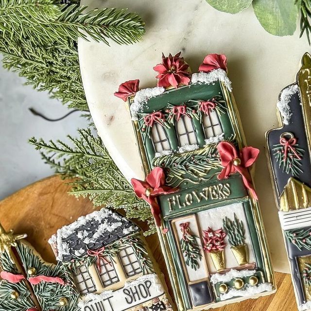 Charming Seasonal Storefront Cookies: Intricately Iced and Festively Colored Delights.