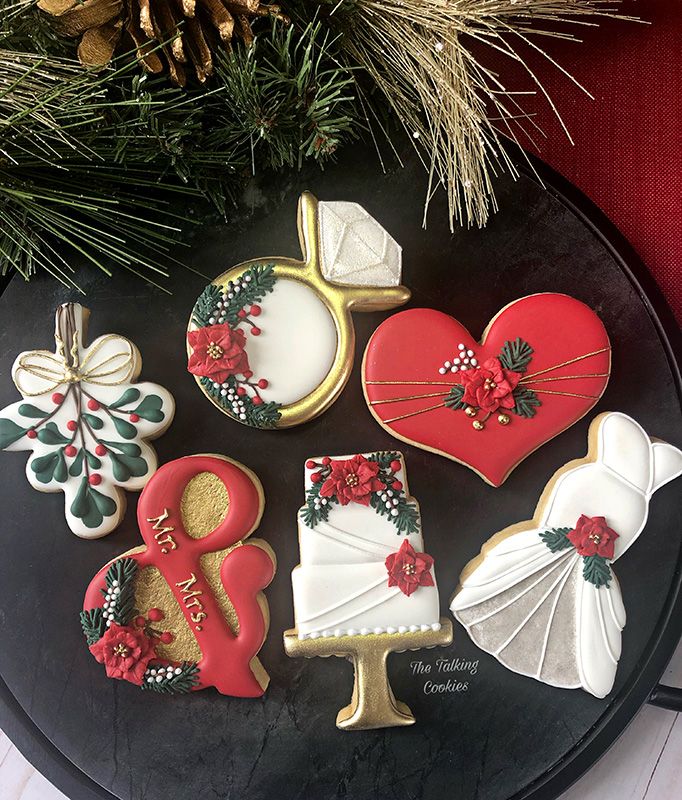 Elegant Holiday Cookies with Luxurious Festive Designs in Red and Gold.