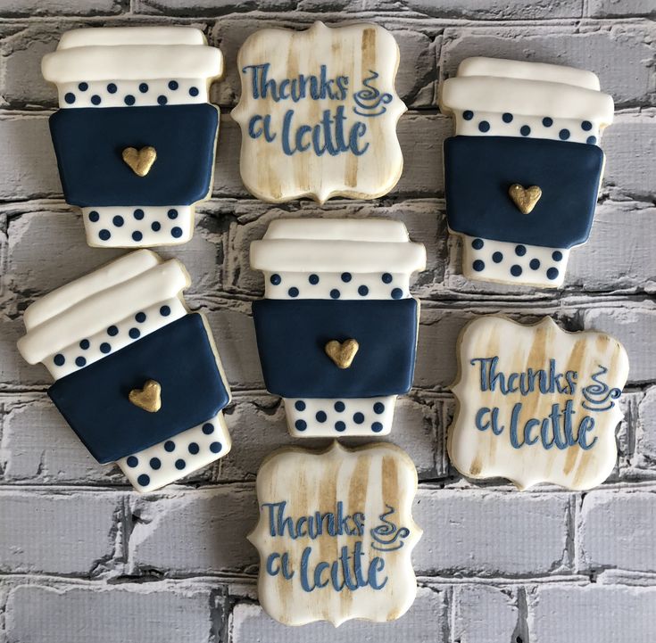 Charming Coffee-Themed Cookies: Cozy Blue and White Designs with Polka Dots and Hearts.