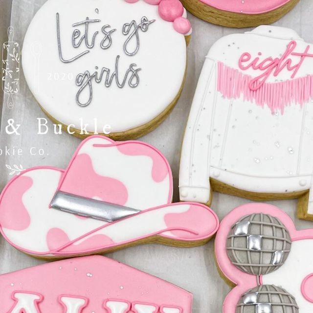 Vibrant Pink and White Cowboy-Themed Cookies for Festive Celebrations.