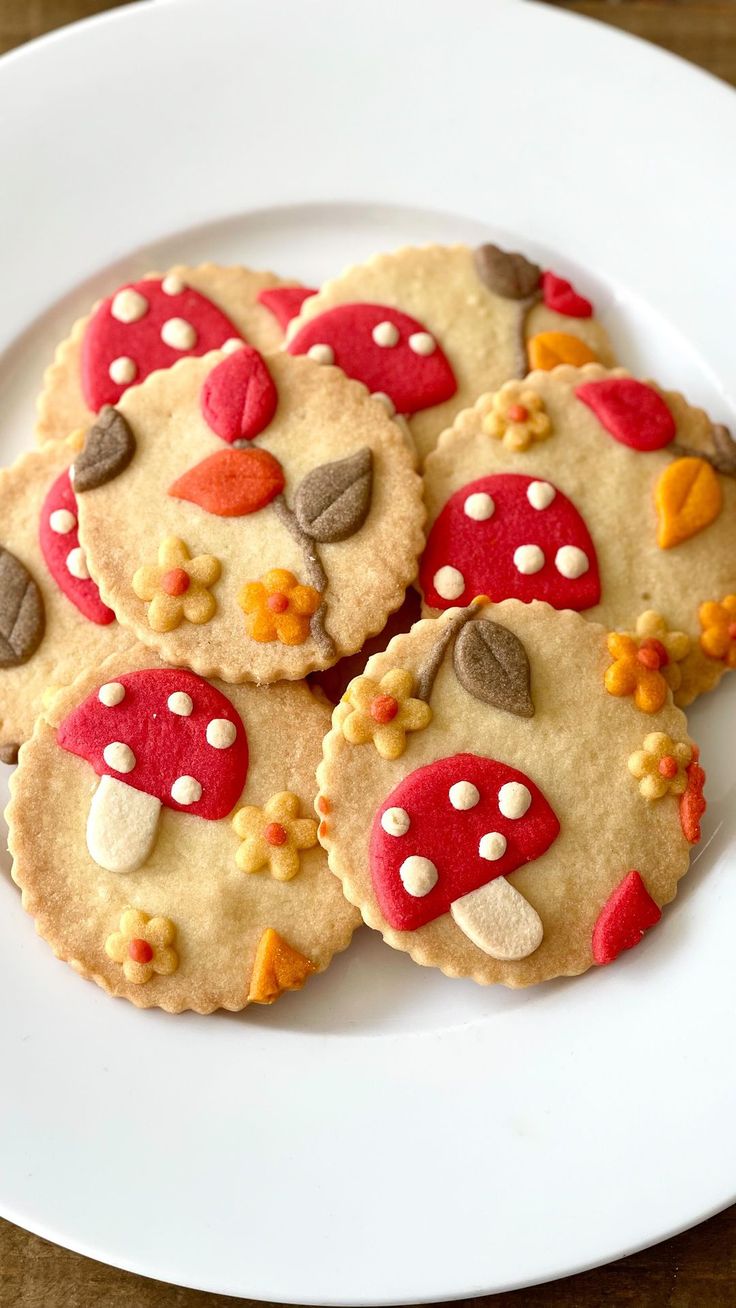 Whimsical Mushroom-Themed Cookies with Vibrant Colors and Charming Floral Accents for Festive Gatherings.