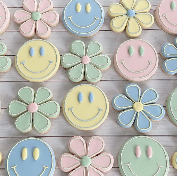 Whimsical Pastel Cookie Designs Embrace Joy with Smiley Faces and Flower Shapes for Celebrations.