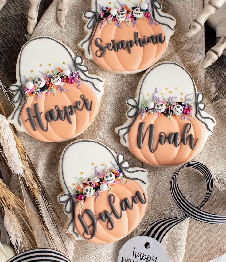 Festive Pumpkin-Themed Decorative Cookies with Whimsical Designs and Pastel Accents.