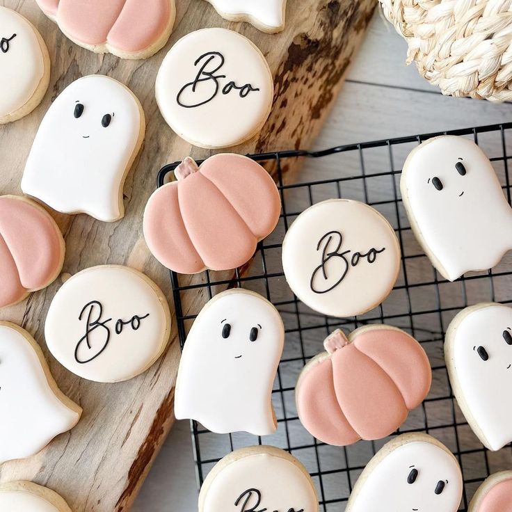 Whimsical Halloween Cookies with Playful Ghosts and Pastel Pumpkins.