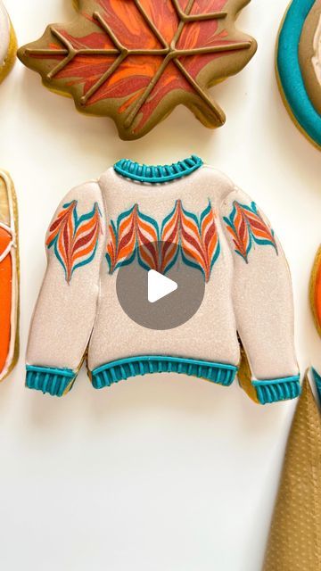 Vibrant Autumn-Inspired Festive Sweater Design with Intricate Leaf Patterns.