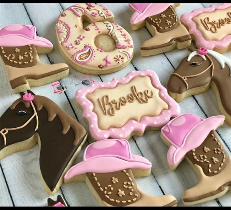 Playful Cowboy-Themed Cookies with Colorful Designs for Festive Celebrations