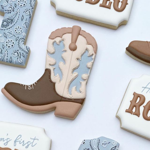 Festive Cowboy Boot Cookies with Intricate Patterns and Western Motifs