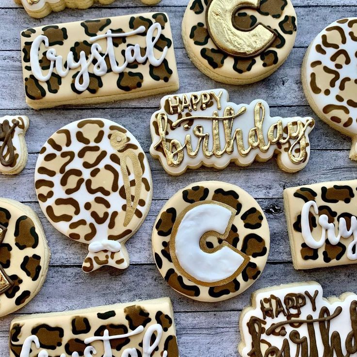 Luxurious Gold and White Cheetah Print Cookies: Elegant and Fun Birthday Treats.