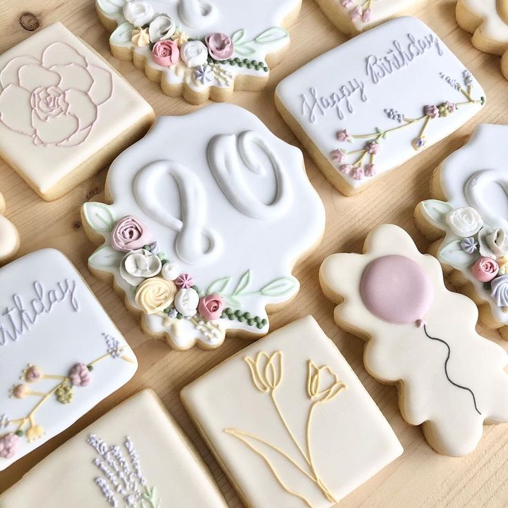 Whimsical Floral-Adorned Cookies in Soft Pastel Hues