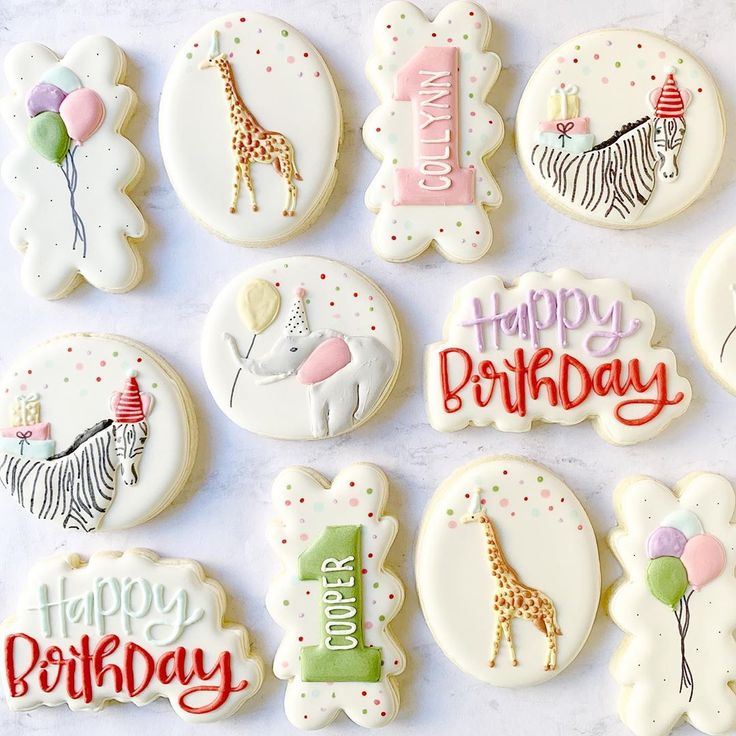 Whimsical Animal-Themed Birthday Cookies: Adorable Giraffes and Zebras Celebrating with Balloons and Messages.