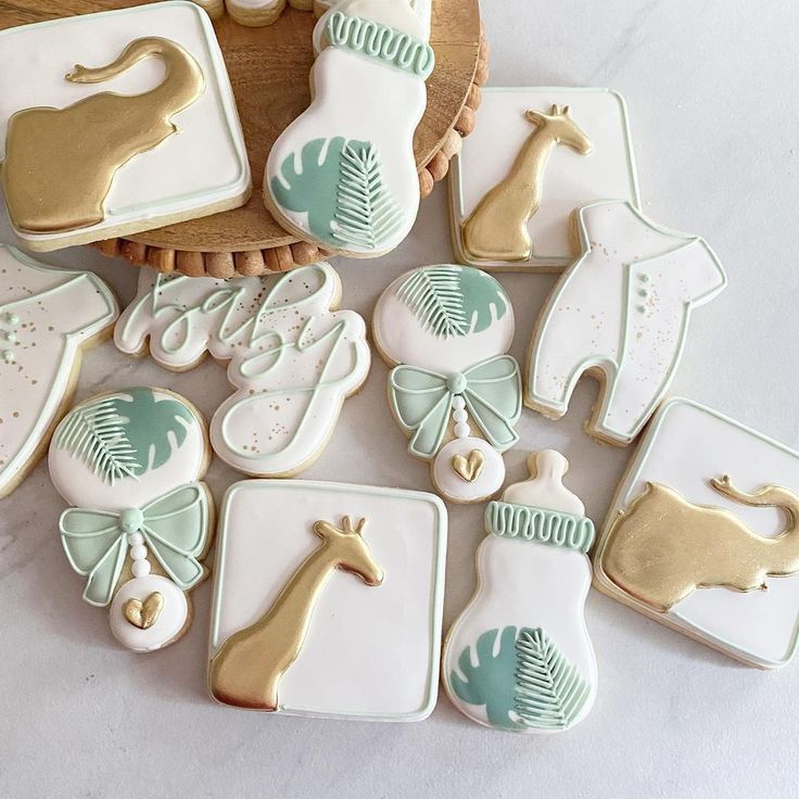 Elegant Baby Shower Cookies with Playful Animal Designs and Sophisticated Accents.