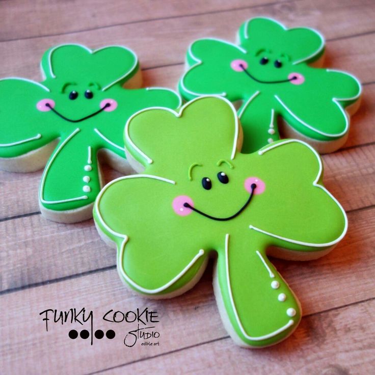 Cheerful Shamrock Cookies: Festive Treats with Playful Designs and Bright Green Icing.