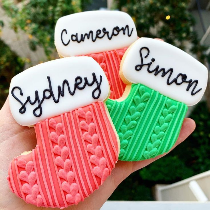 Personalized Colorful Holiday Stocking-Shaped Cookies with Knit-Pattern Icing.