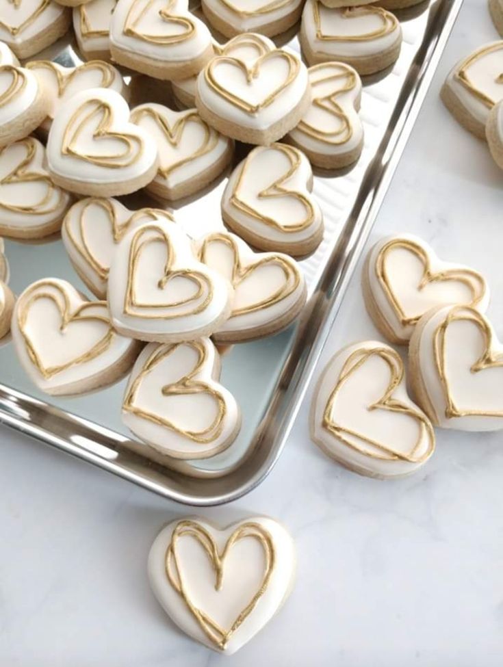 Elegant Heart-Shaped Cookies Artfully Displayed on a Silver Tray