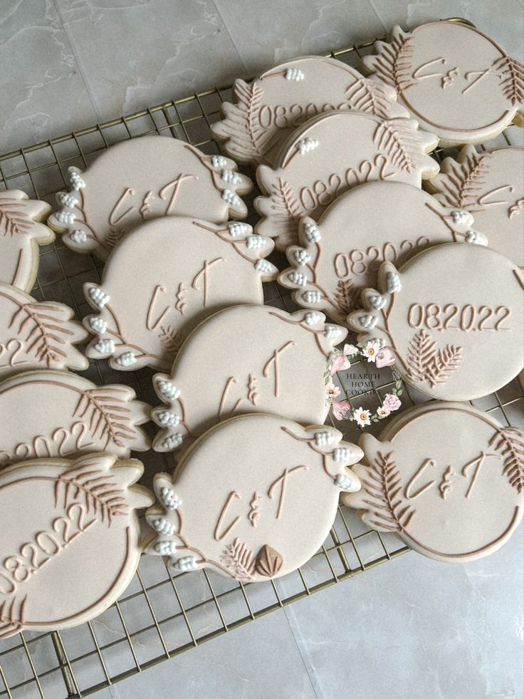 Charming Elegant Cookie Designs with Intricate Embossing and Personalized Touches for Special Occasions.