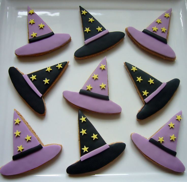 Enchanting Halloween Witch Hat Cookies with Colorful Decor and Star Accents